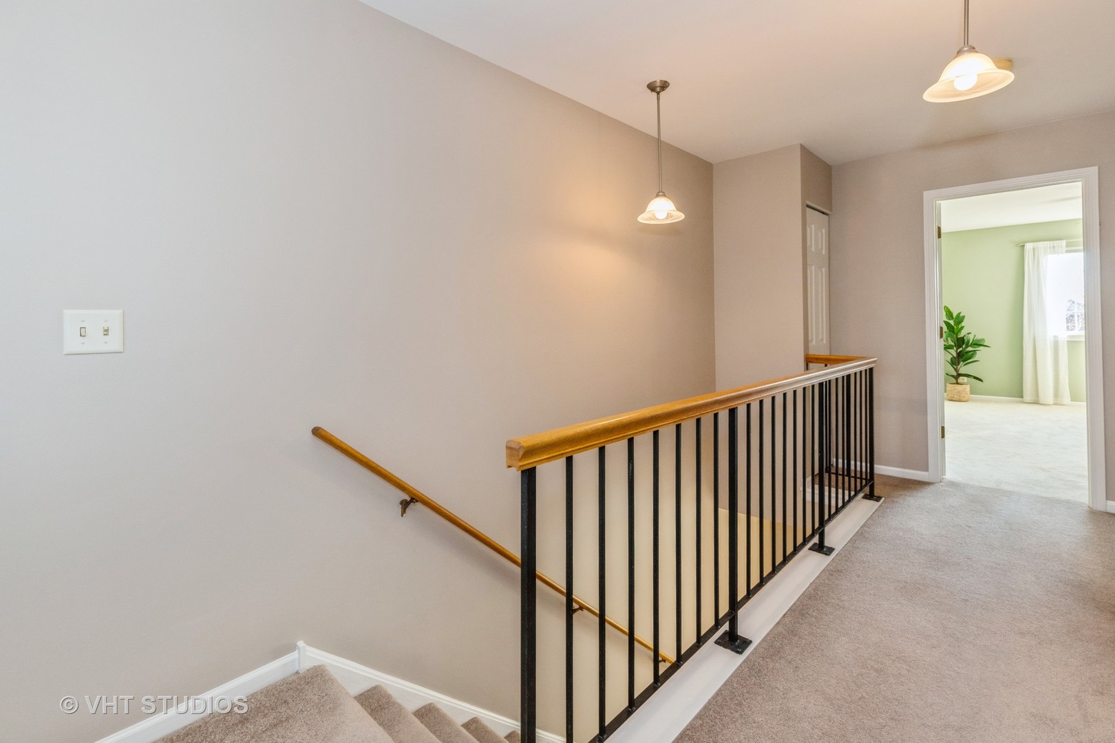 17896 Braewick Road Gurnee, IL 60031 - Photo 9 of 18 a view of a hallway with window and stairs
