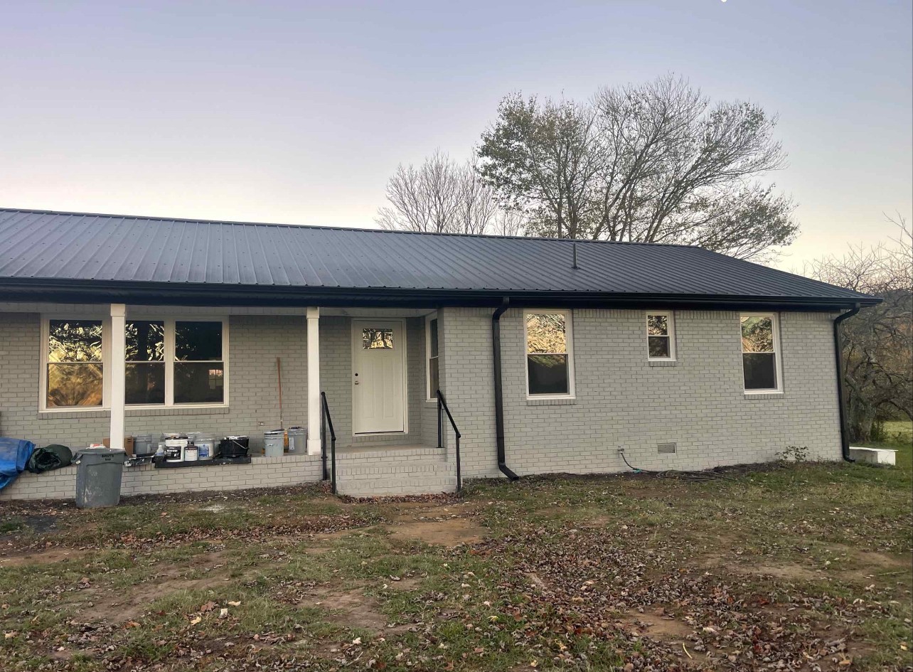 190 Gore Road Lawrenceburg, TN 38464 - Photo 2 of 3 a view of house with backyard