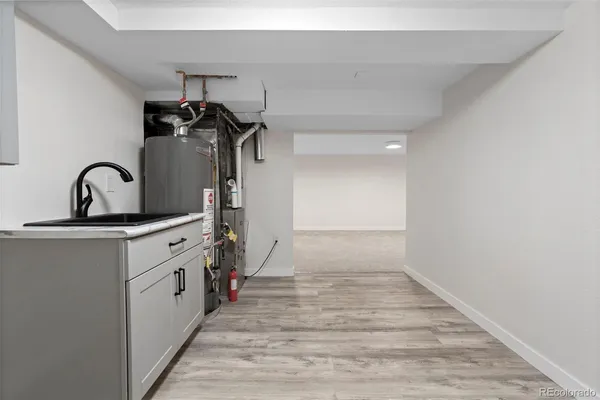 an empty room with a empty space and a window