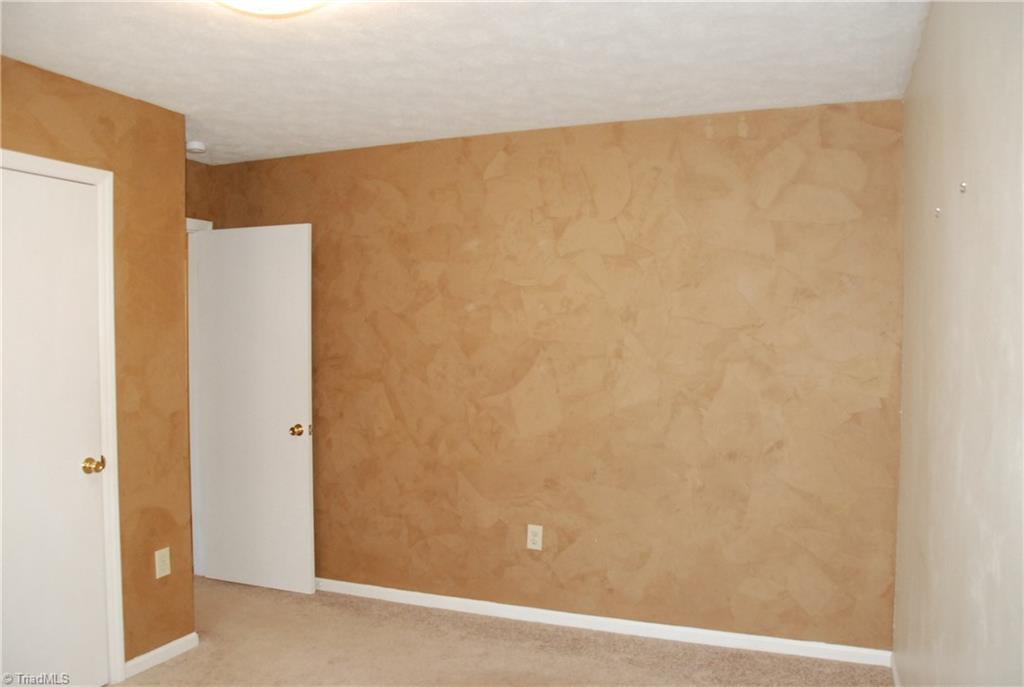 5974 Robinhood Road Pfafftown, NC 27040 - Photo 7 of 22 Master bedroom with custom, hand applied wall treatment on two walls
