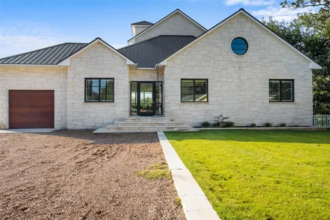 a front view of house with yard