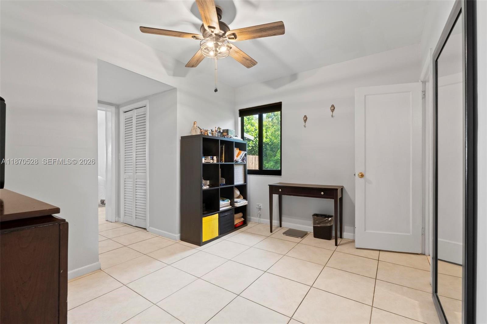 6539 Southwest 84th Avenue Miami, FL 33143 - Photo 20 of 26 a view of an entryway with a workspace