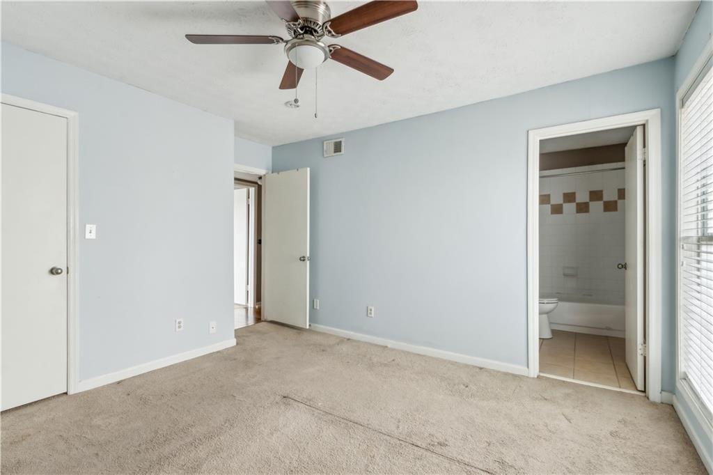 3155 Seven Pines, Unit 303 Atlanta, GA 30339 - Photo 13 of 25 wooden floor in an empty room