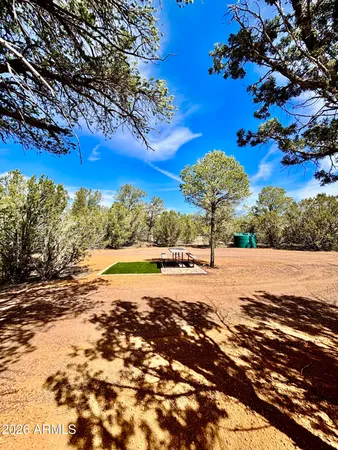 a view of an ocean & house