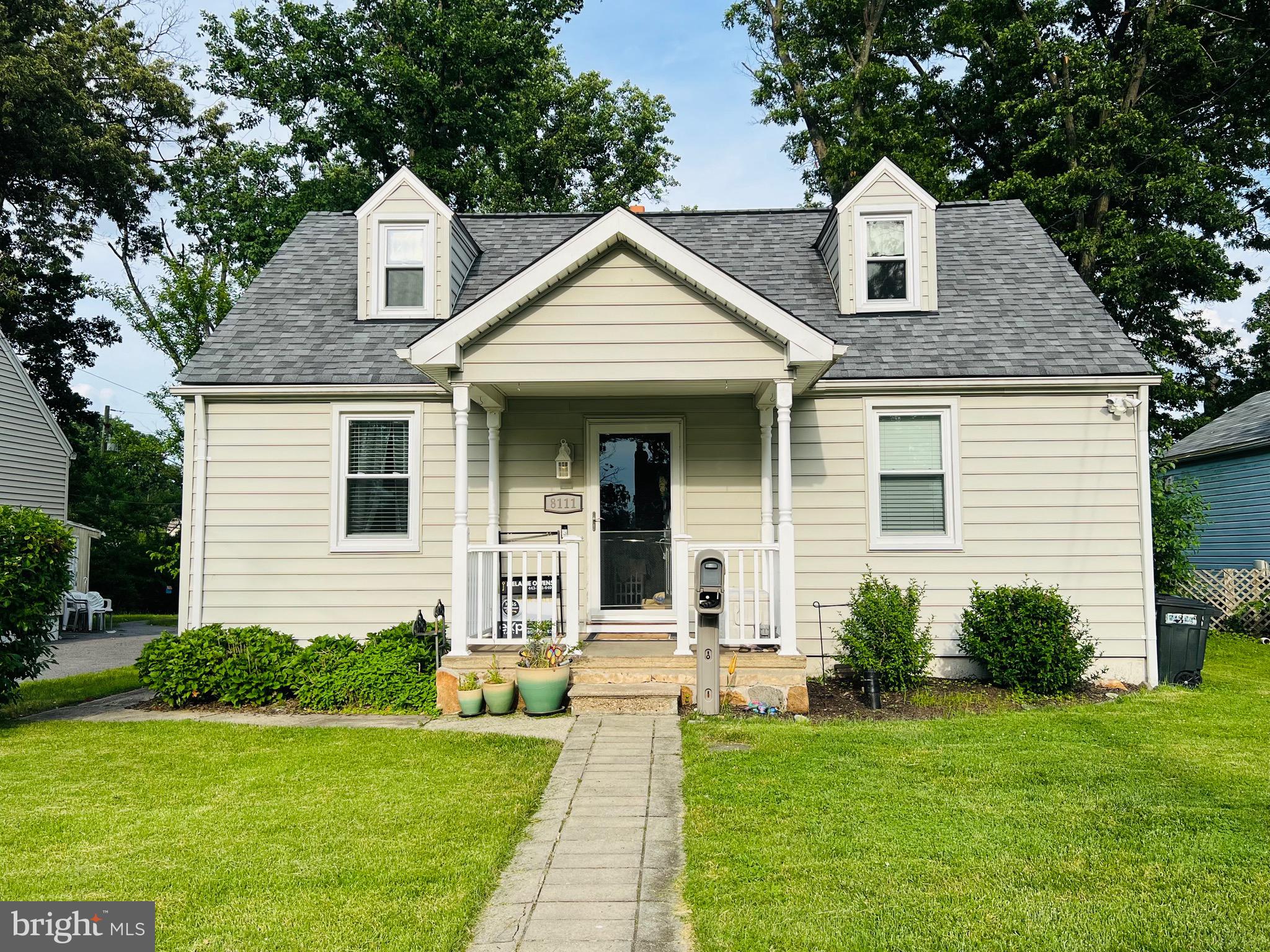 8111 Hillendale Road Baltimore, MD 21234 - Photo 1 of 21 a front view of a house with a yard