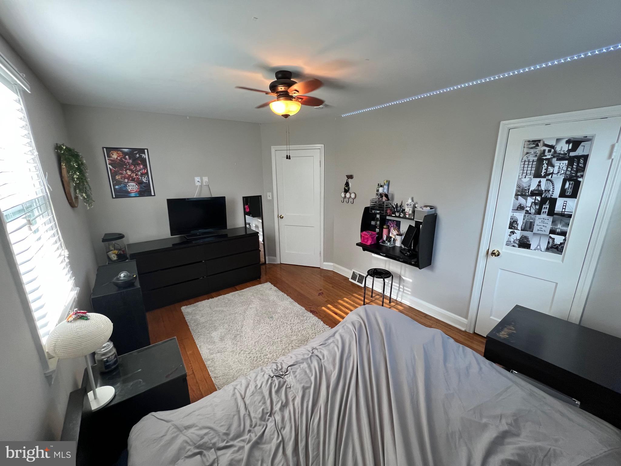8111 Hillendale Road Baltimore, MD 21234 - Photo 13 of 21 a living room with furniture and a flat screen tv