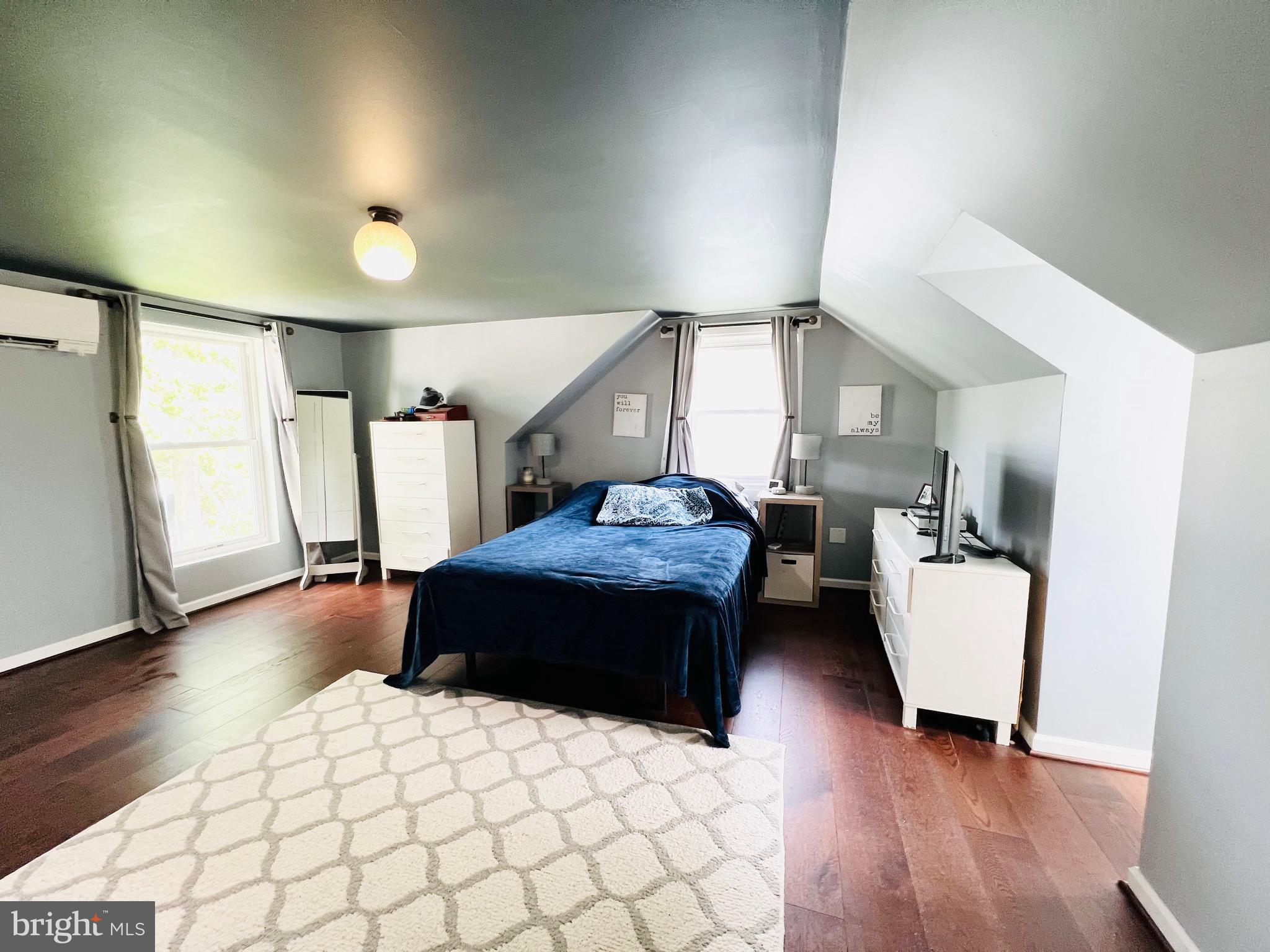 8111 Hillendale Road Baltimore, MD 21234 - Photo 15 of 21 a bedroom with a bed and a couch