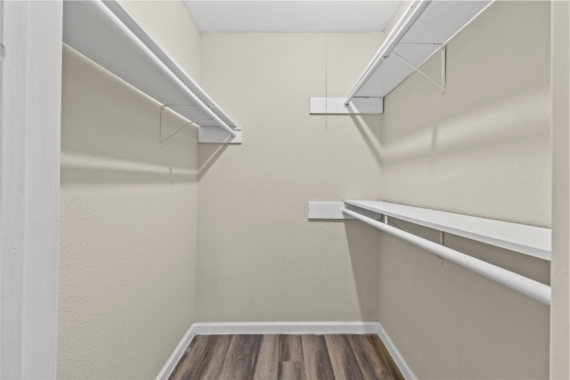 5026 Fitzwater Drive Spring, TX 77373 - Photo 13 of 14 a view of walk in closet with empty racks