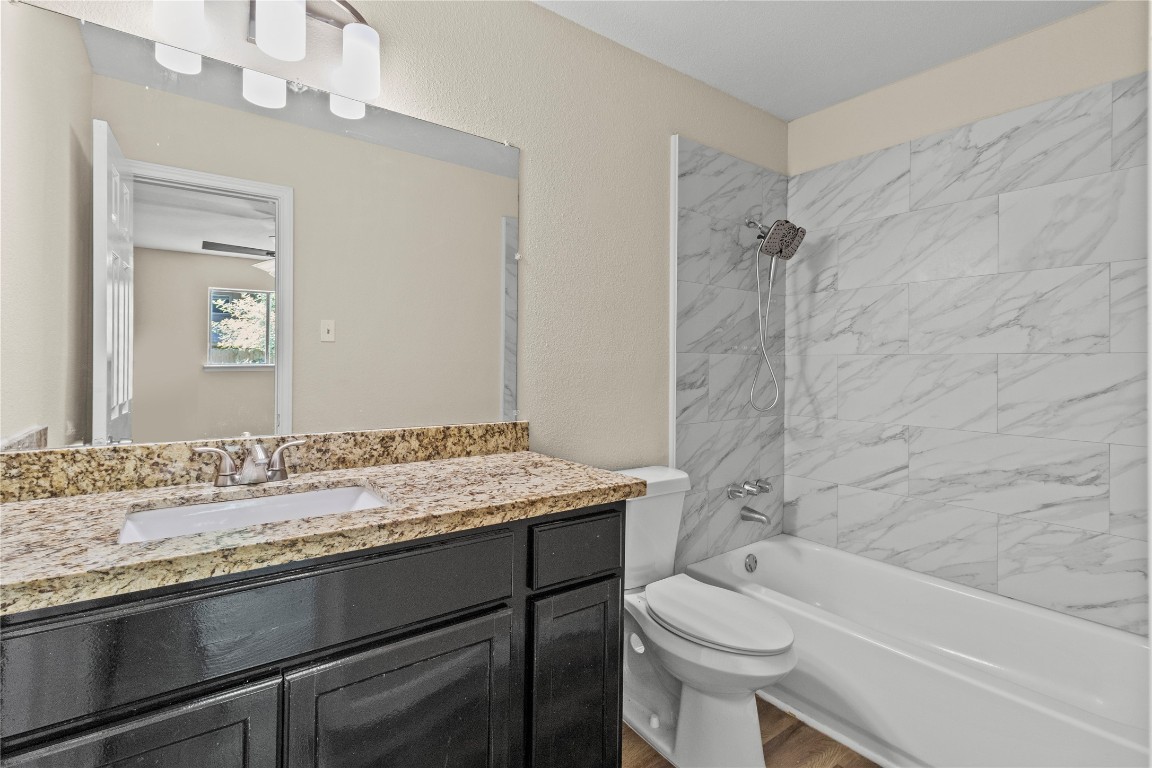 5026 Fitzwater Drive Spring, TX 77373 - Photo 14 of 14 a bathroom with a sink a toilet and shower