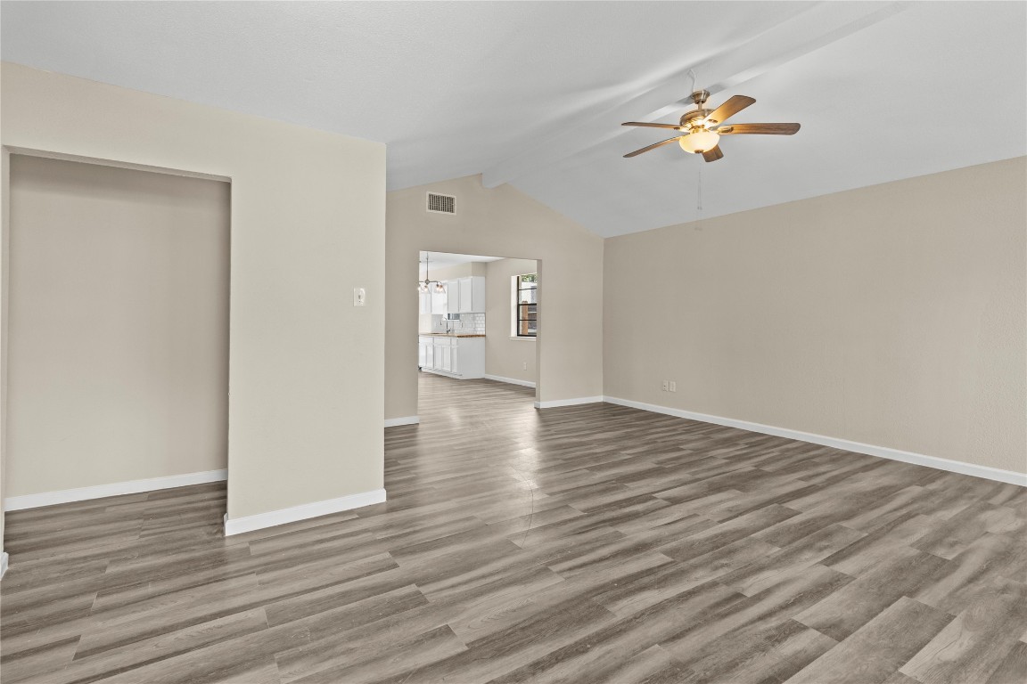 5026 Fitzwater Drive Spring, TX 77373 - Photo 5 of 14 a view of an empty room with wooden floor and window