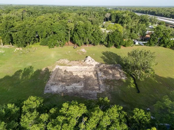 a view of a lake with a yard