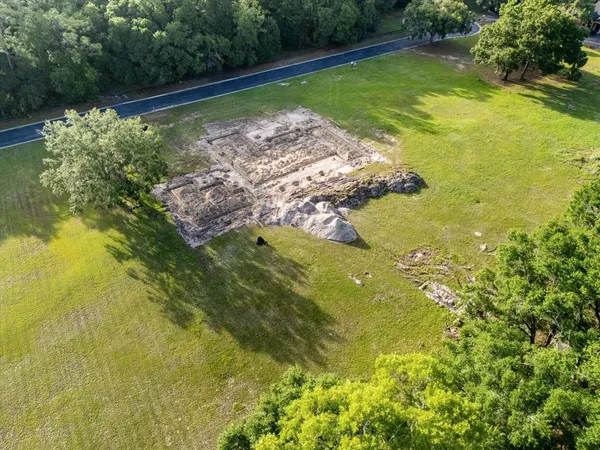 a view of a lake with a yard