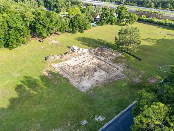 a view of a garden with a lake