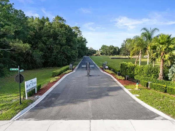 a view of swimming pool with a yard