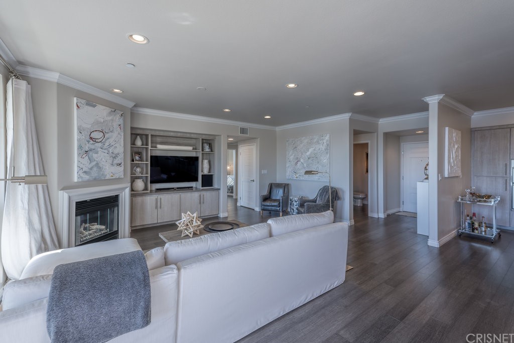 4346 Tradewinds Drive Oxnard, CA 93035 - Photo 12 of 35 a living room with furniture and a flat screen tv