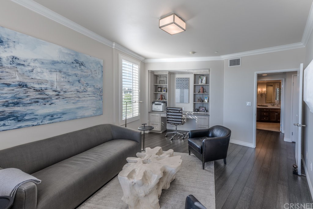 4346 Tradewinds Drive Oxnard, CA 93035 - Photo 21 of 35 a living room with furniture and wooden floor