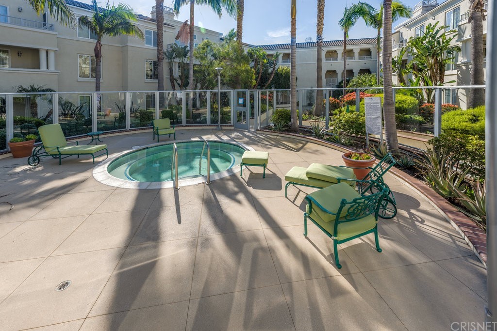 4346 Tradewinds Drive Oxnard, CA 93035 - Photo 28 of 35 a swimming pool with outdoor seating and yard