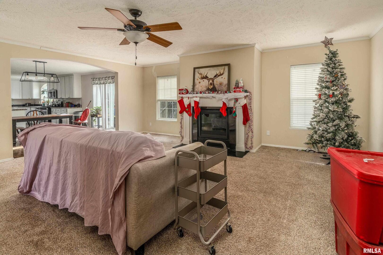 1201 Pine Ridge Lane Makanda, IL 62958 - Photo 12 of 36 a bed room with a bed and a chandelier