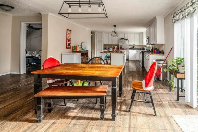 a kitchen with stainless steel appliances granite countertop a stove and a sink