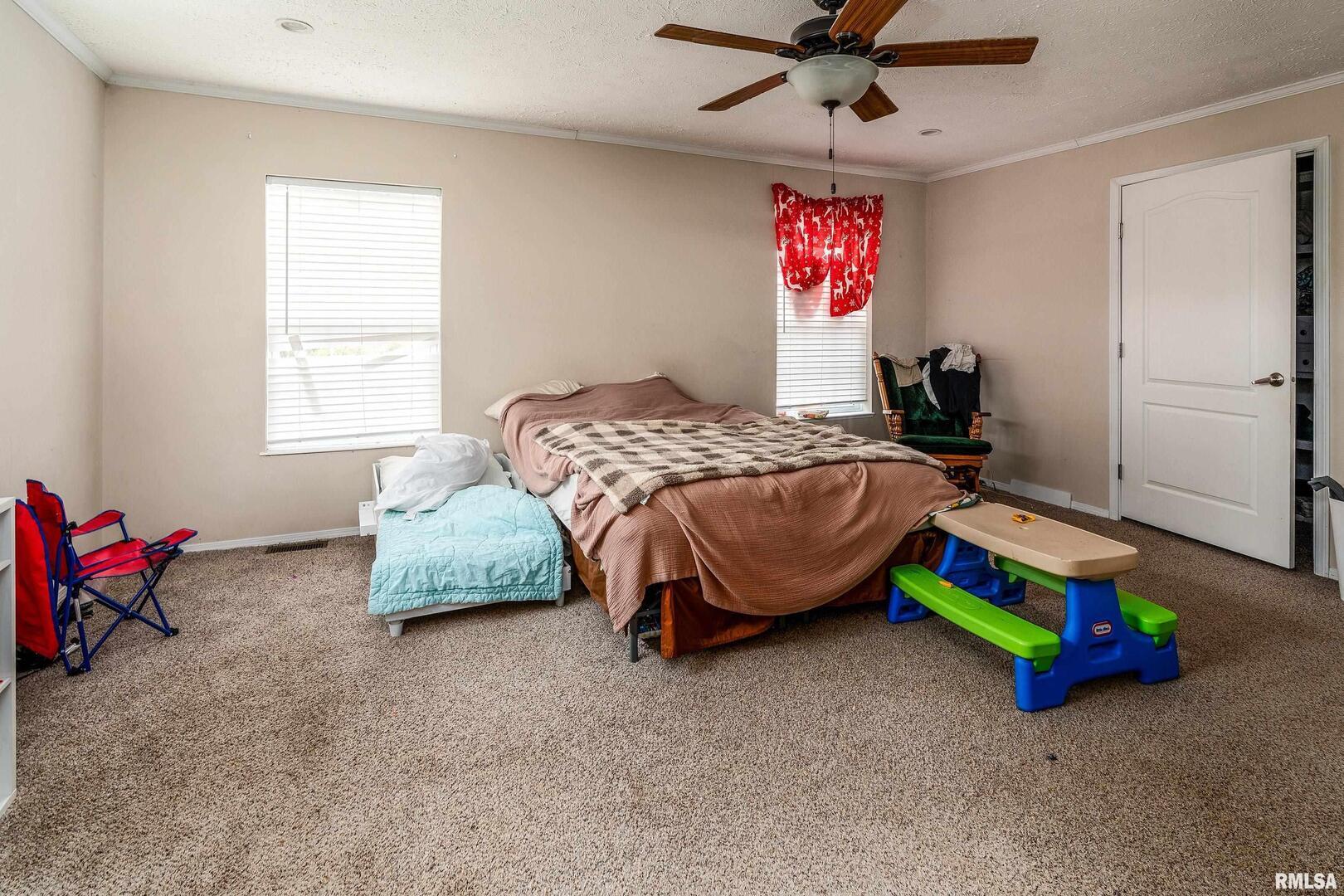 1201 Pine Ridge Lane Makanda, IL 62958 - Photo 22 of 36 a bedroom with bed table and window