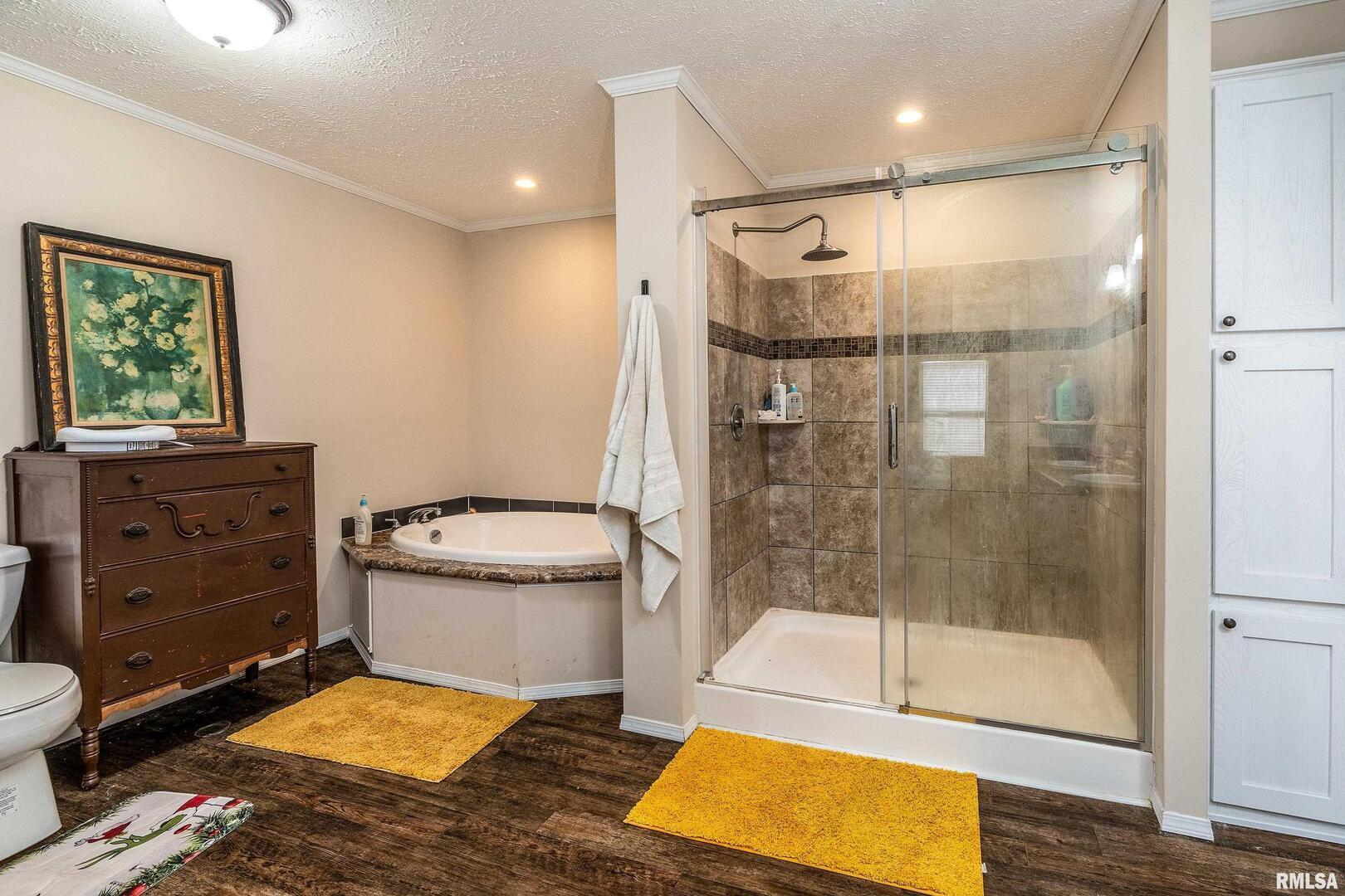 1201 Pine Ridge Lane Makanda, IL 62958 - Photo 25 of 36 a bathroom with a tub and a shower