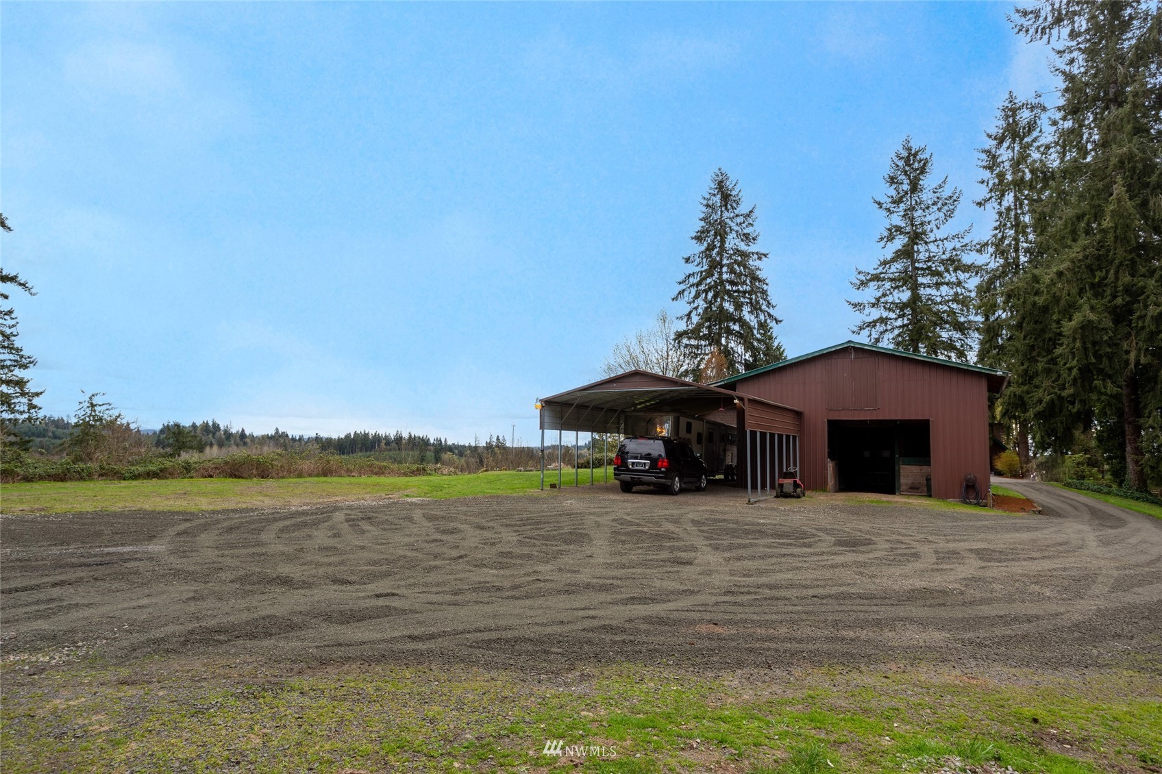 12409 Case Road Southwest Olympia, WA 98512 - Photo 24 of 34 a view of a house with a yard and sitting area