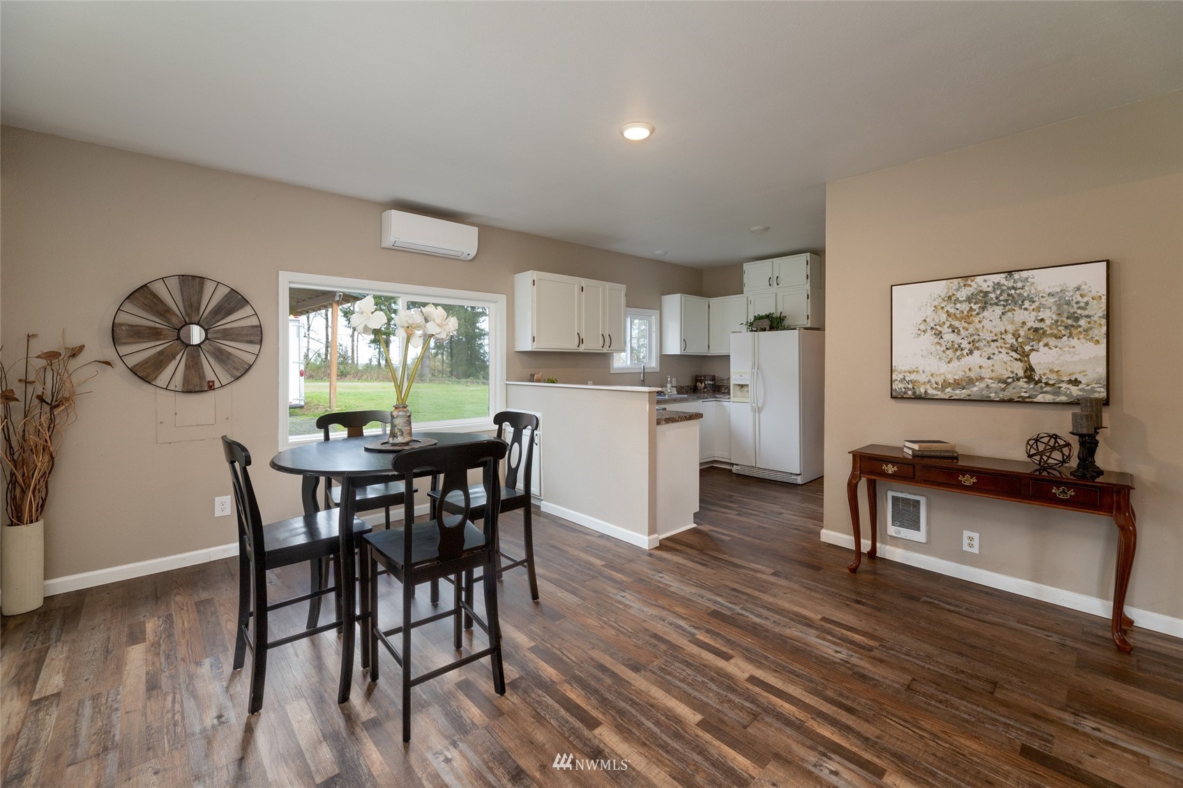 12409 Case Road Southwest Olympia, WA 98512 - Photo 6 of 34 a kitchen with a table and chairs in it