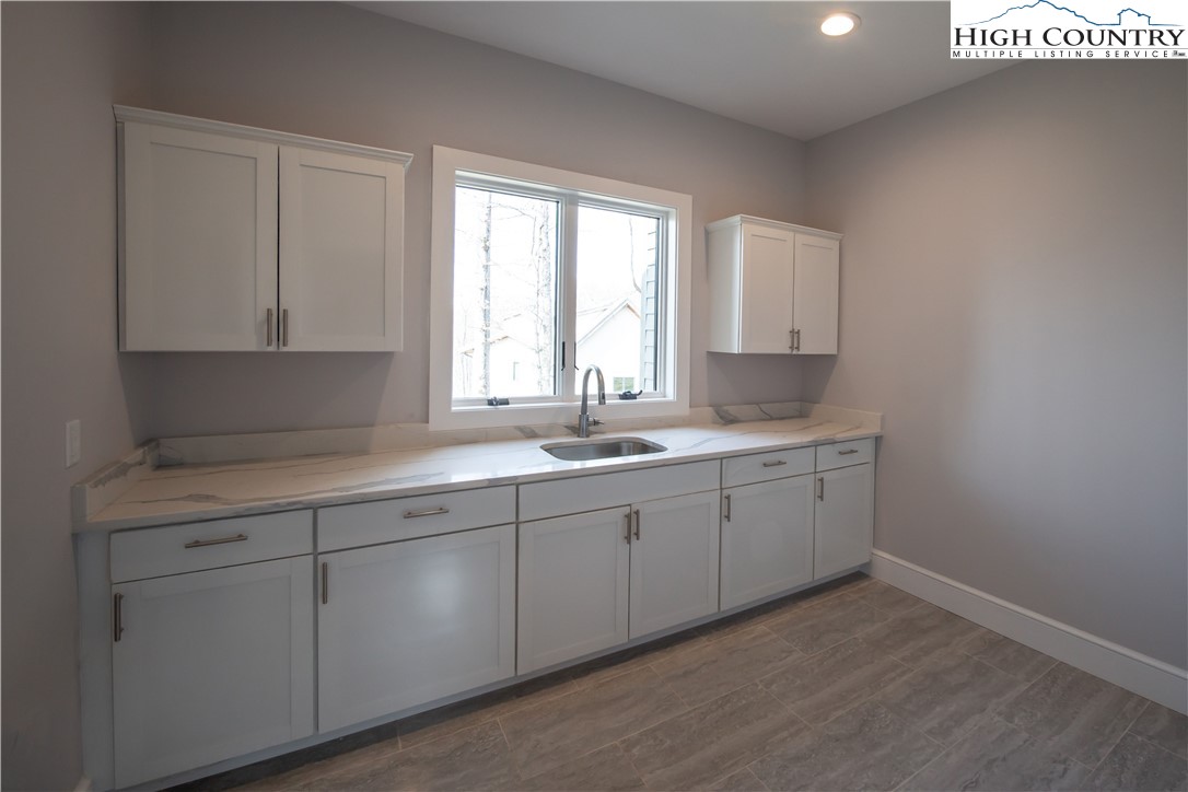 280 Boulder Cay Road Boone, NC 28607 - Photo 19 of 33 a kitchen with sink and window