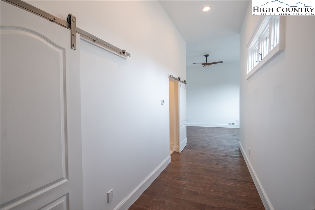 280 Boulder Cay Road Boone, NC 28607 - Photo 31 of 33 a view of hallway with wooden floor
