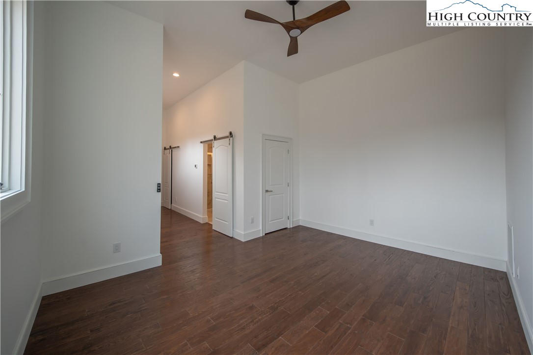 280 Boulder Cay Road Boone, NC 28607 - Photo 33 of 33 a view of a room with wooden floor and white walls