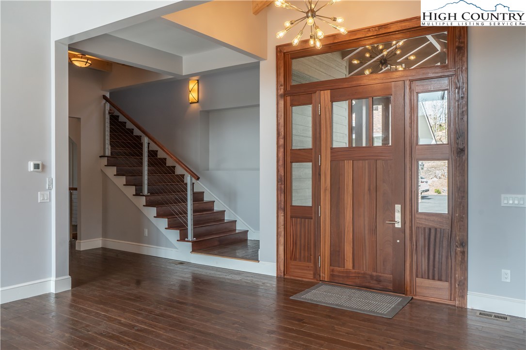 280 Boulder Cay Road Boone, NC 28607 - Photo 4 of 33 a view of entryway and hall with wooden floor