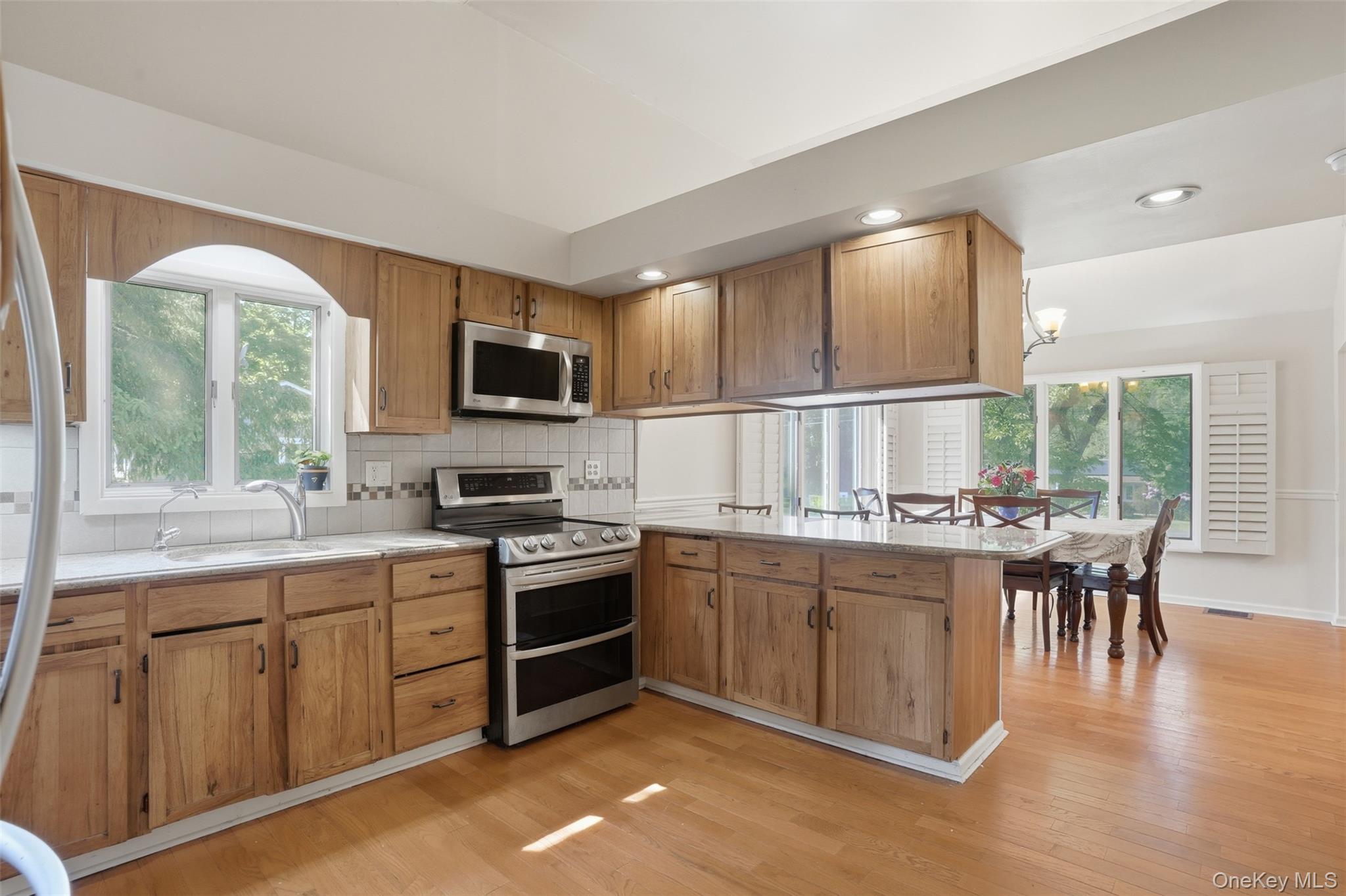 147 County Rte 1 Warwick, NY 10990 - Photo 13 of 45 a kitchen with lots of counter top space and stainless steel appliances