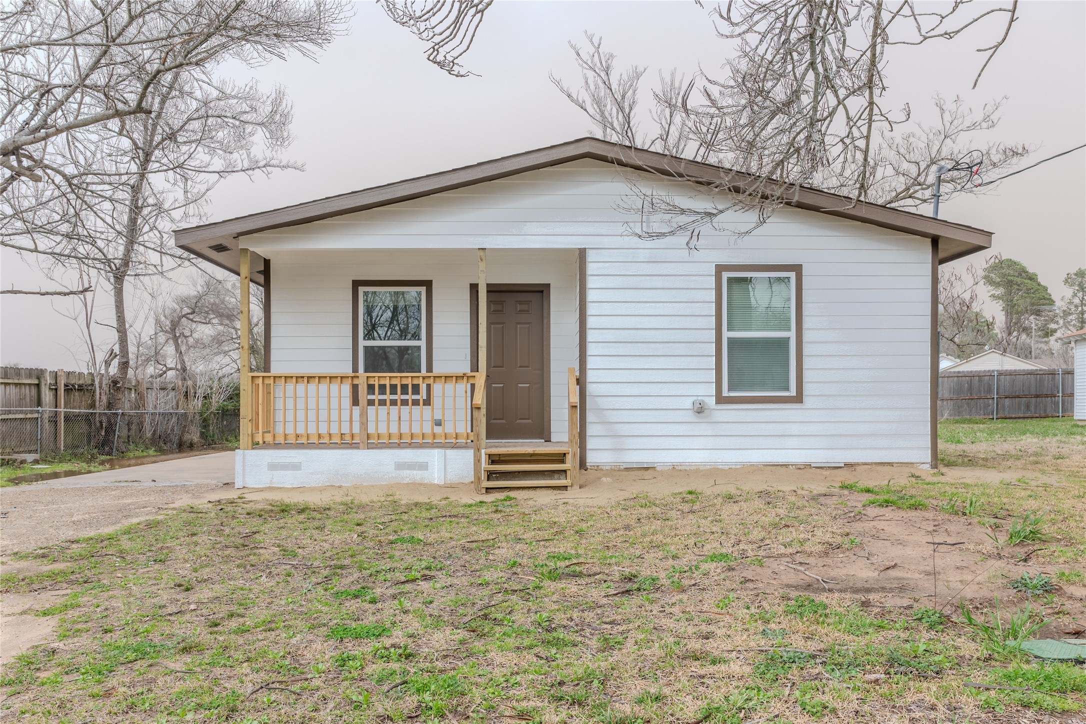 729 Planters Street Emory, TX 75440 - Photo 1 of 22 a view of a house with a yard