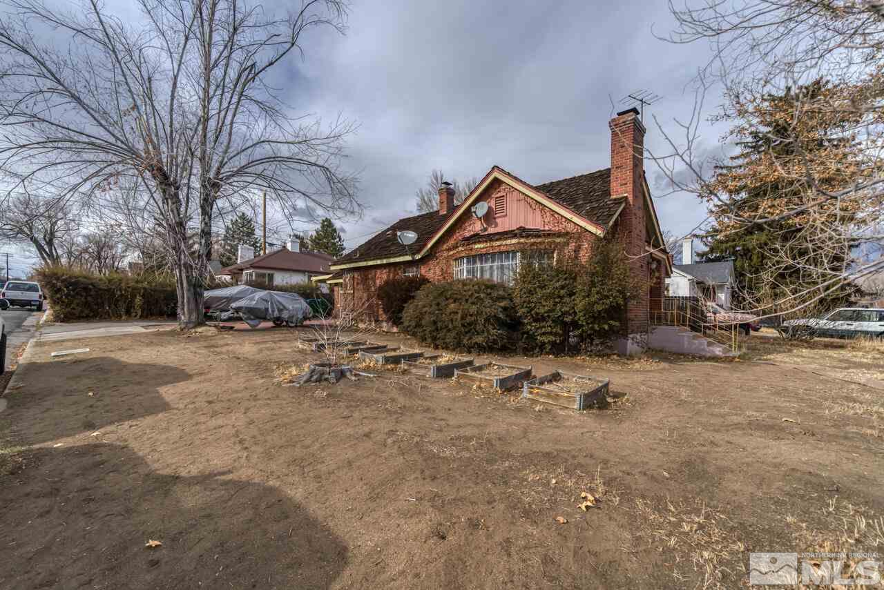 701 West Pueblo Street Reno, NV 89509 - Photo 2 of 30 a view of a house with a yard covered in snow