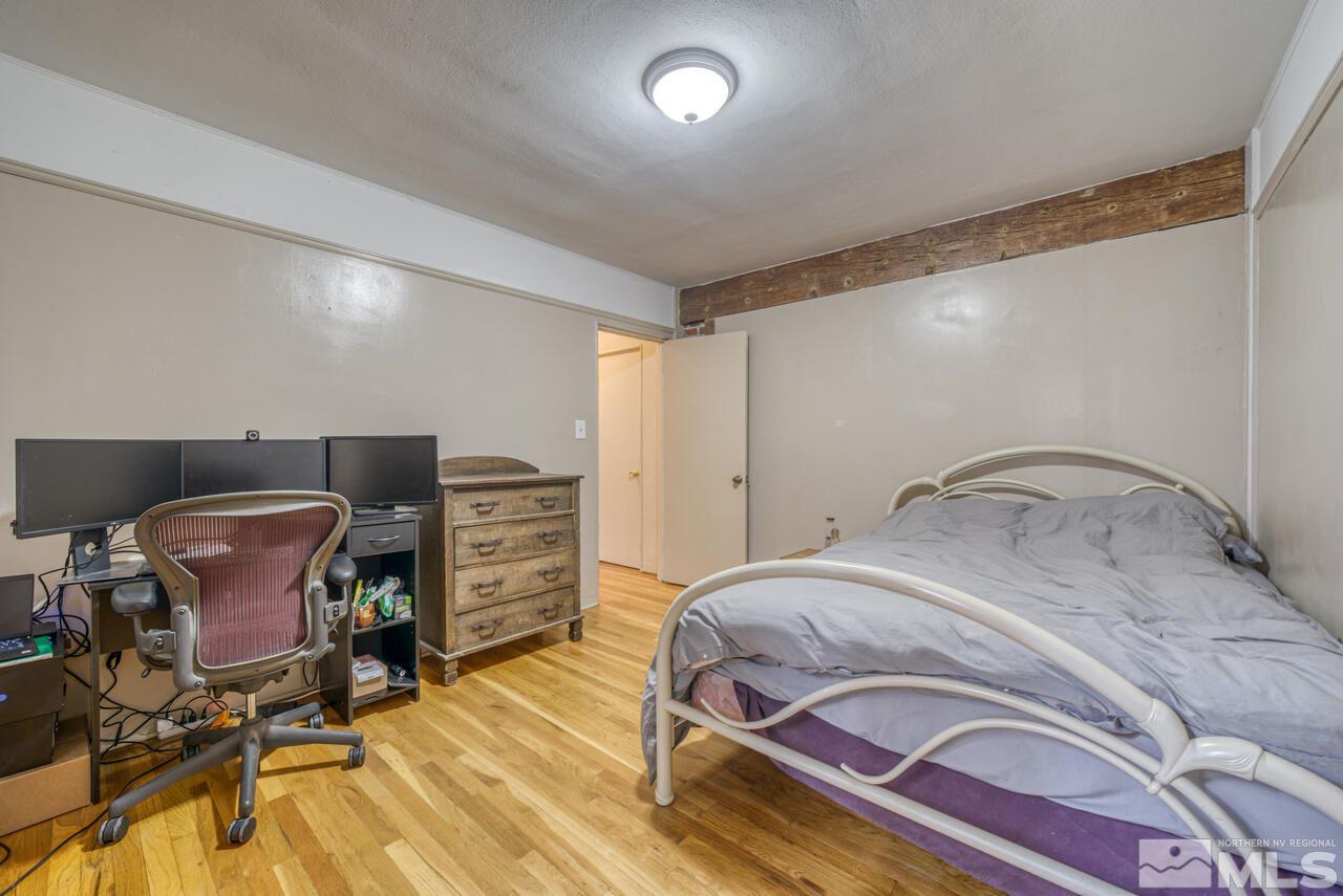 701 West Pueblo Street Reno, NV 89509 - Photo 24 of 30 a bedroom with a bed and chair