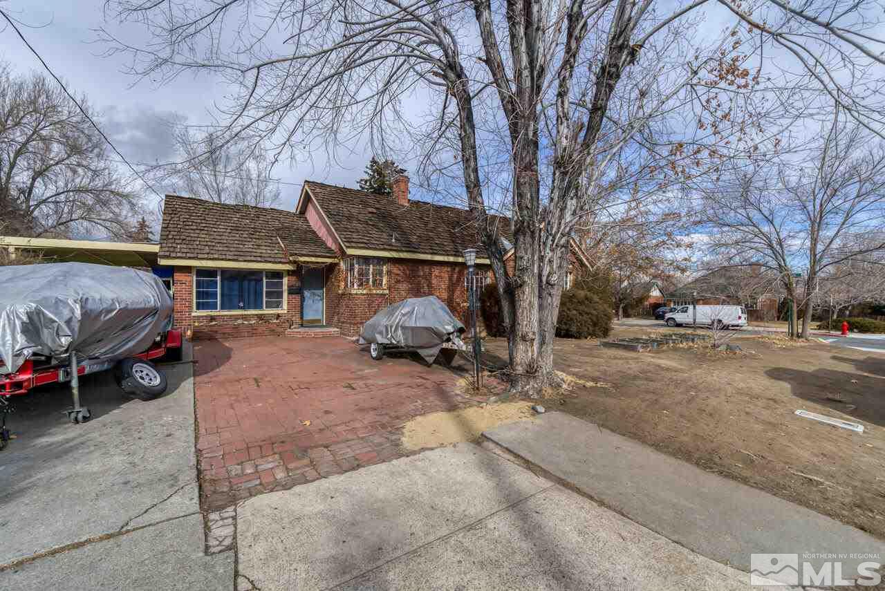 701 West Pueblo Street Reno, NV 89509 - Photo 3 of 30 a view of a house with a yard covered in snow