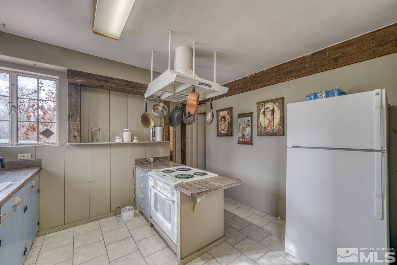 701 West Pueblo Street Reno, NV 89509 - Photo 5 of 30 a kitchen with a stove and a refrigerator