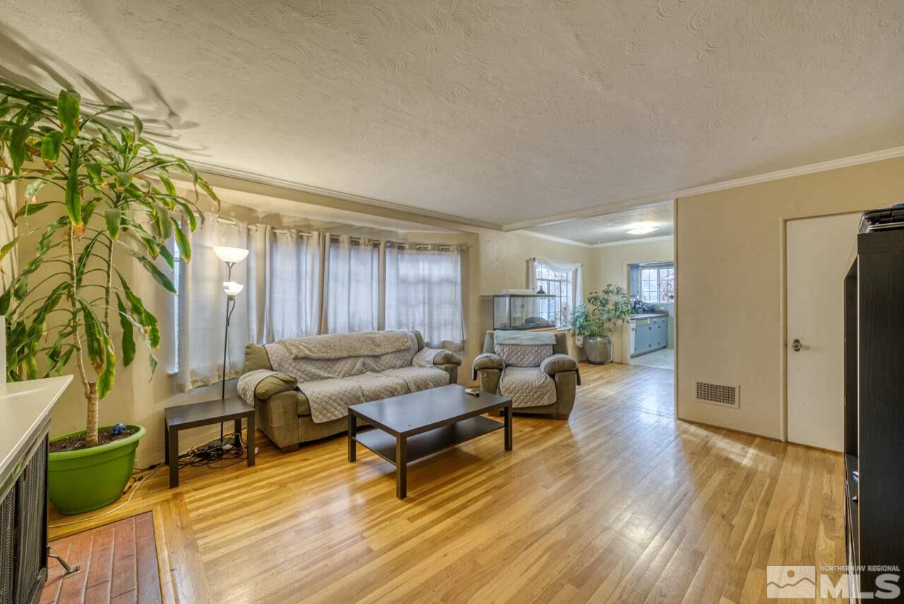 701 West Pueblo Street Reno, NV 89509 - Photo 10 of 30 a living room with furniture and a wooden floor