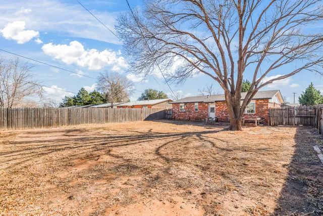 a view of large space with trees