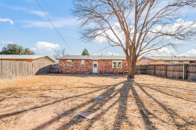 a street view with wooden fence