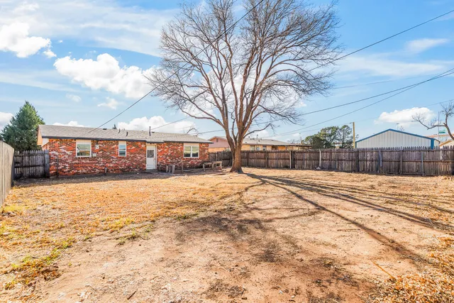 a view of large building with a outdoor space