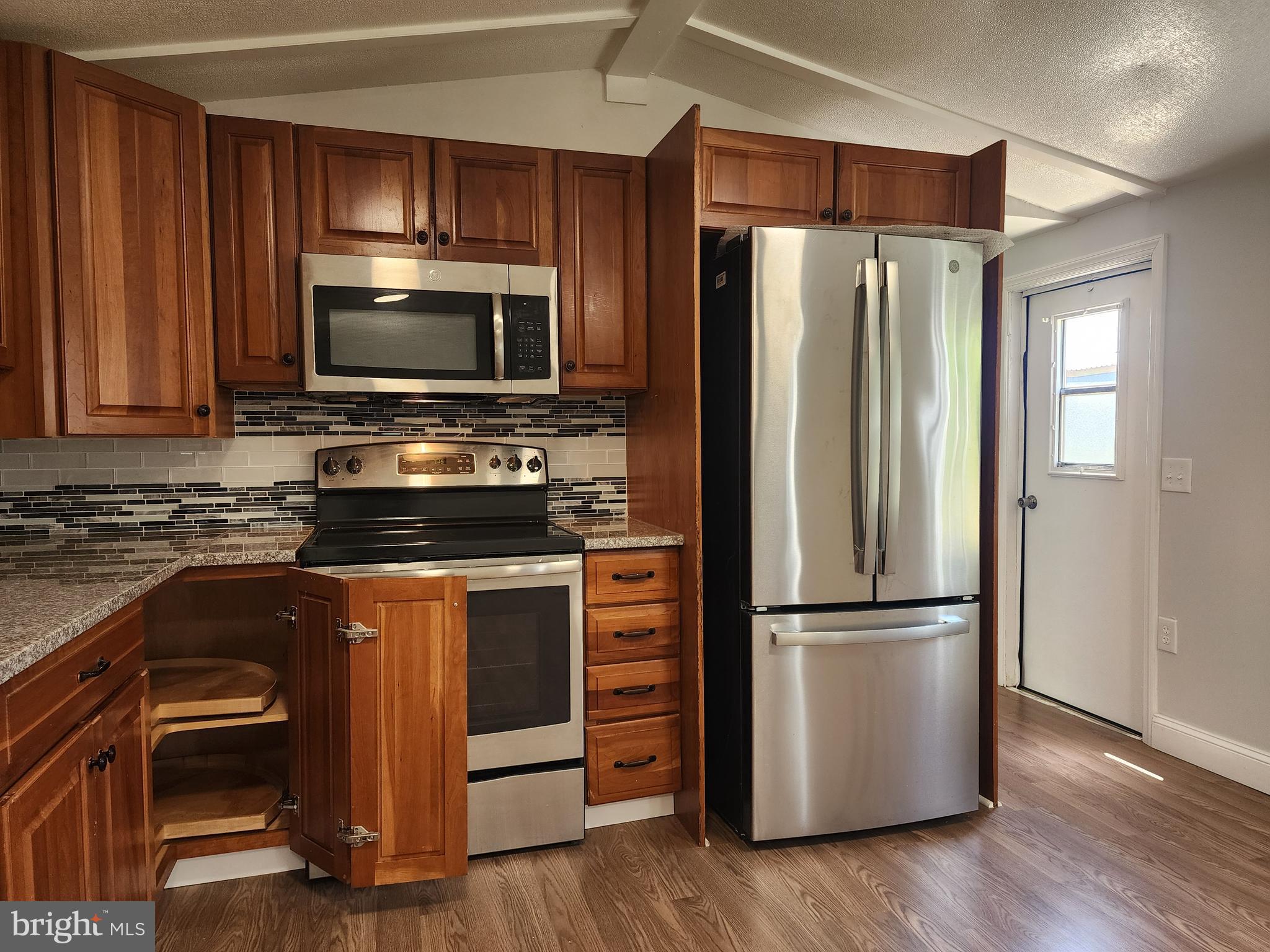 41 Mountain View Terrace Newville, PA 17241 - Photo 12 of 34 a kitchen with stainless steel appliances a refrigerator stove and microwave