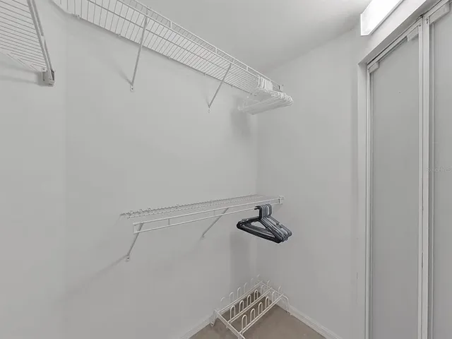 a view of small space with racks on the wall