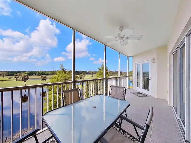 a view of a balcony with furniture