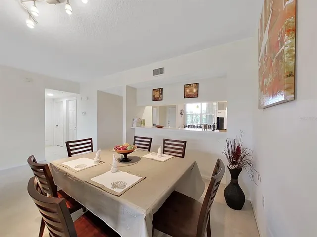 a view of a workspace with furniture