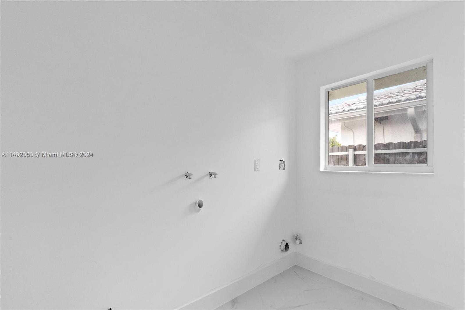 15951 Southwest 42nd Terrace Miami, FL 33185 - Photo 14 of 40 a small space with a window
