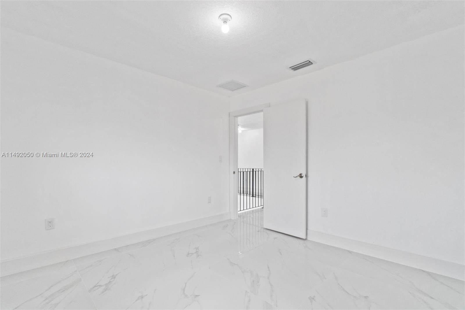 15951 Southwest 42nd Terrace Miami, FL 33185 - Photo 19 of 40 a view of an empty room