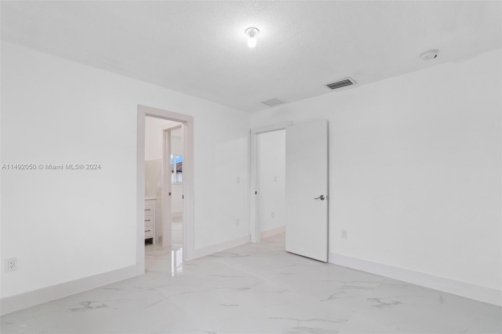 15951 Southwest 42nd Terrace Miami, FL 33185 - Photo 23 of 40 a view of an empty room
