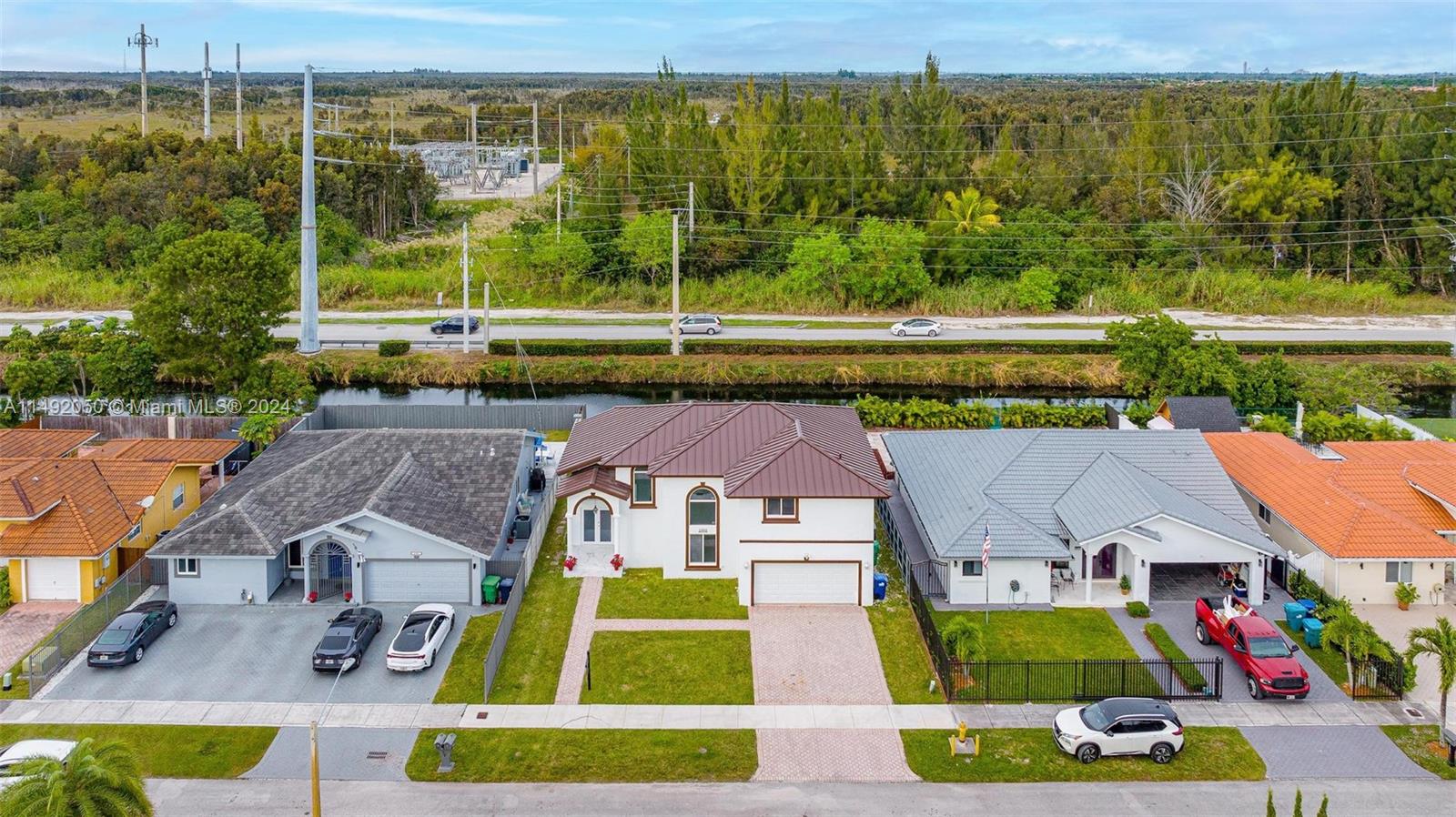 15951 Southwest 42nd Terrace Miami, FL 33185 - Photo 36 of 40 an aerial view of houses with yard