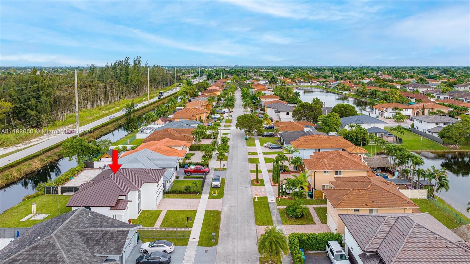15951 Southwest 42nd Terrace Miami, FL 33185 - Photo 40 of 40 an aerial view of multiple houses with yard